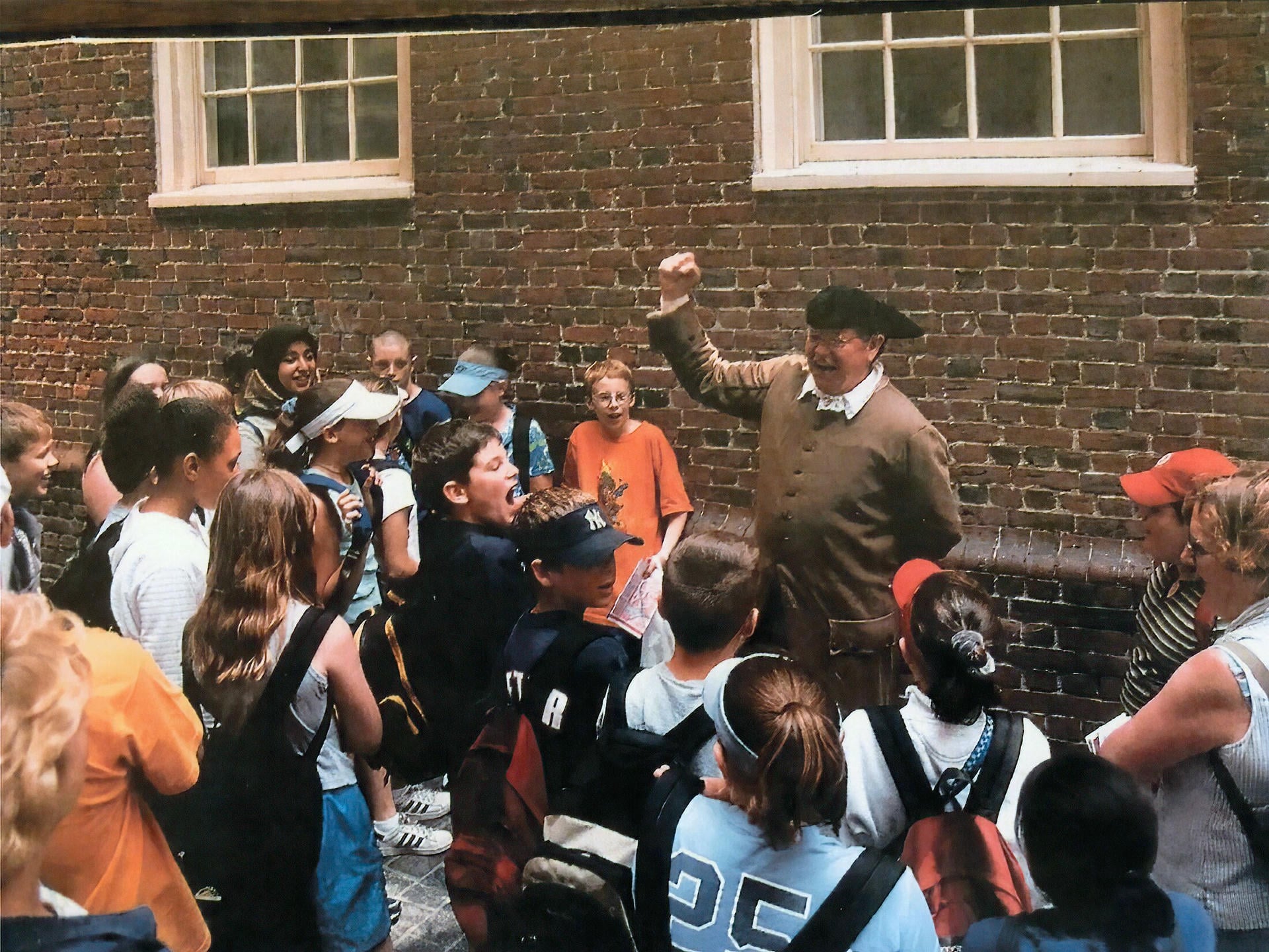 Old Corner Bookstore - guide leading tour of kids